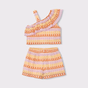 Conjunto pantalón corto y top asimétrico niña